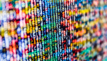 Blurred rows of multi-coloured digital data