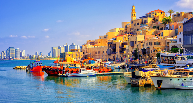 Old town and port of Jaffa and modern skyline of Tel Aviv city, Israel.